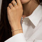 Image of 14K Yellow Gold Baseline Eternity Tennis Bracelet on Models Arm