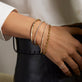 Image of 14K Yellow Gold Baseline Eternity Tennis Bracelet with Stone and Strand Bracelets