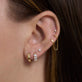 Image of 14K Yellow Gold Bold Gold Huggie Earring with Stone and Strand Earrings