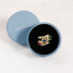 Still life image of Sapphire Bonbon Merge Ring with Stone and Strand Gift Box