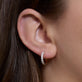 Image of 14K Yellow Gold Lab-Created Bold Second Hole Hoops on Models Ear