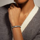 Image of Sterling Silver Coil Royale Silver Bracelet on Models Neck