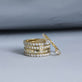 Still life image of Diamond Channel Ring with Stone and Strand solid gold jewelry