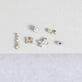 Still life image of Teeny Diamond Line Princess Earrings with Stone and Strand solid gold jewelry