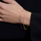 Image of 10K Yellow Gold Evil Eye Bracelet with Stone and Strand Bracelets