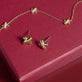 Still life image of Golden Kisses Studs with Stone and Strand solid gold jewelry