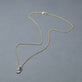 Stone and Strand 10K Yellow Gold Little Leaf Necklace Editorial Image