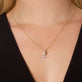 Image of 10K Yellow Gold Little Leaf Necklace on Models Neck