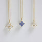 Still life image of Luckiest Clover Blue Sapphire Necklace with Stone and Strand solid gold jewelry