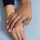 Model wearing Cher Ring with solid gold Stone and Strand jewelry