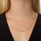 Image of 14K Yellow Gold Pivot by Stone and Strand Smashed Rolo Chain on Models Neck