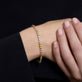 Image of 10K Yellow Gold Rainbow Bright Tennis Bracelet on Models Arm