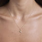 Image of 10K Yellow Gold Take A Pizza My Heart Necklace with Ruby on Models Neck