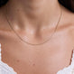 Image of 10K Yellow Gold Thin Snake Necklace on Models Neck