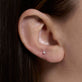 Image of 10K Yellow Gold Tiny Diamond Stud on Models Ear